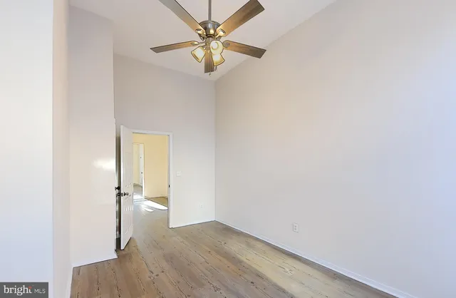 a view of a livingroom with wooden floor