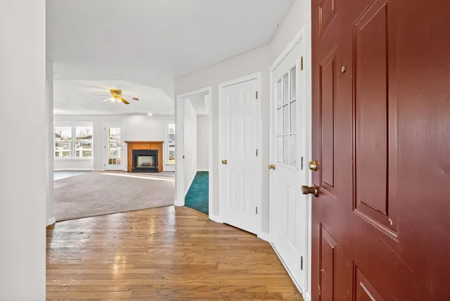 a view of kitchen with furniture and wooden floor