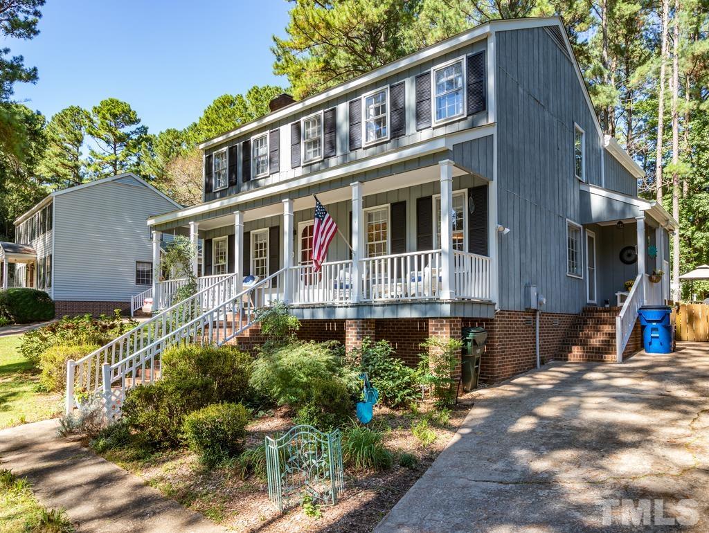 5808 Heatherbrook Circle Raleigh, NC 27612 - Photo 2 of 26 a front view of a house with a yard