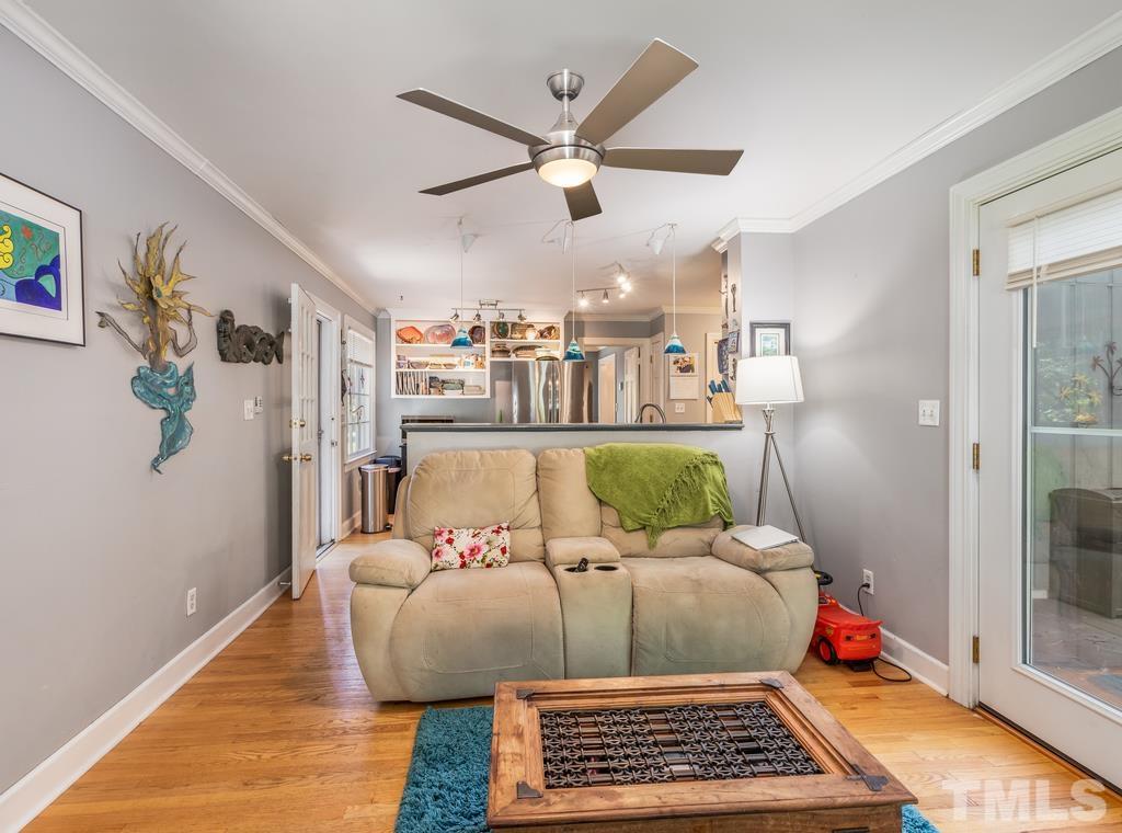 5808 Heatherbrook Circle Raleigh, NC 27612 - Photo 14 of 26 a bed room with a bed and a couch