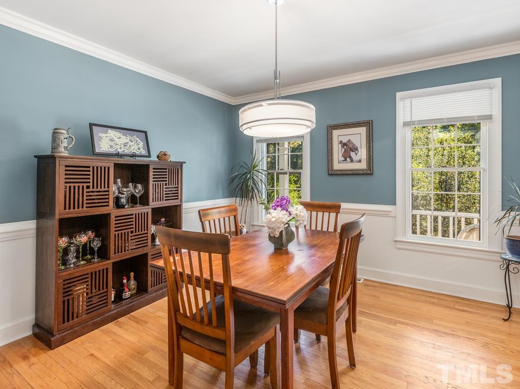 5808 Heatherbrook Circle Raleigh, NC 27612 - Photo 9 of 26 a dining room with furniture and window
