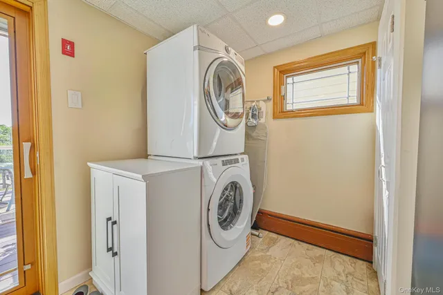 a utility room with dryer and washer