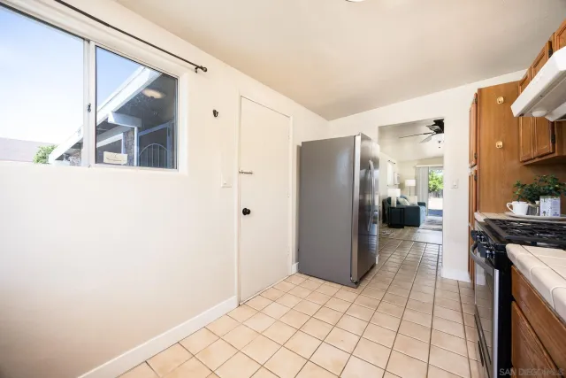 a bedroom with a bed and a table