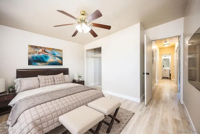 a bathroom with a sink toilet a mirror and shower
