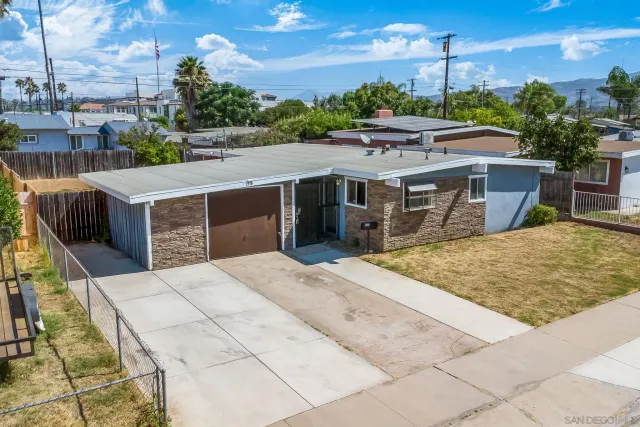 a view of a swimming pool with a patio