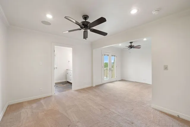 a view of an empty room and window