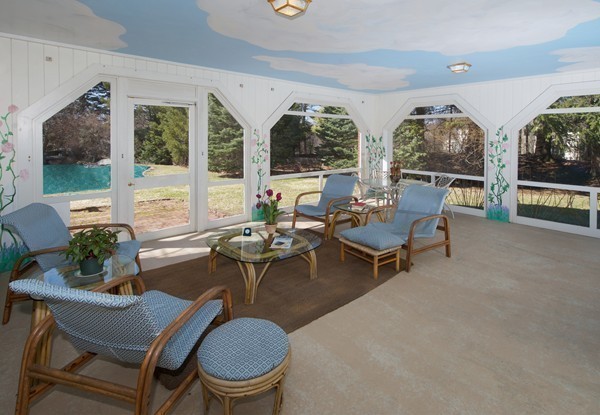 148 Still River Road Harvard, MA 01451 - Photo 23 of 29 a living room with furniture a large window and a table