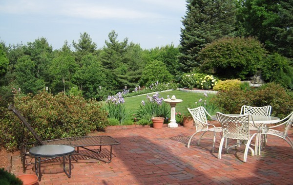 148 Still River Road Harvard, MA 01451 - Photo 25 of 29 a view of a chairs and table in backyard