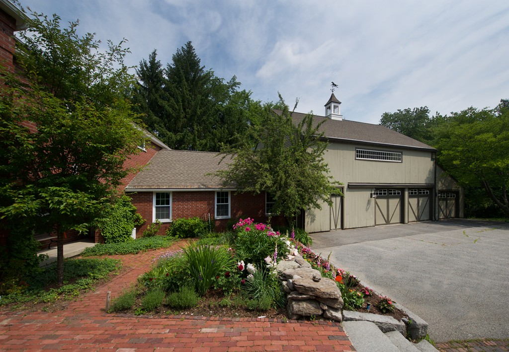 148 Still River Road Harvard, MA 01451 - Photo 28 of 29 a front view of house with yard and green space