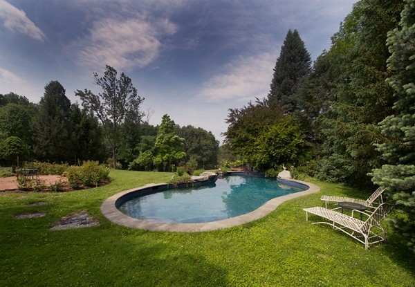 148 Still River Road Harvard, MA 01451 - Photo 4 of 29 a view of a swimming pool with a yard