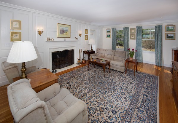 148 Still River Road Harvard, MA 01451 - Photo 9 of 29 a living room with furniture and a fireplace