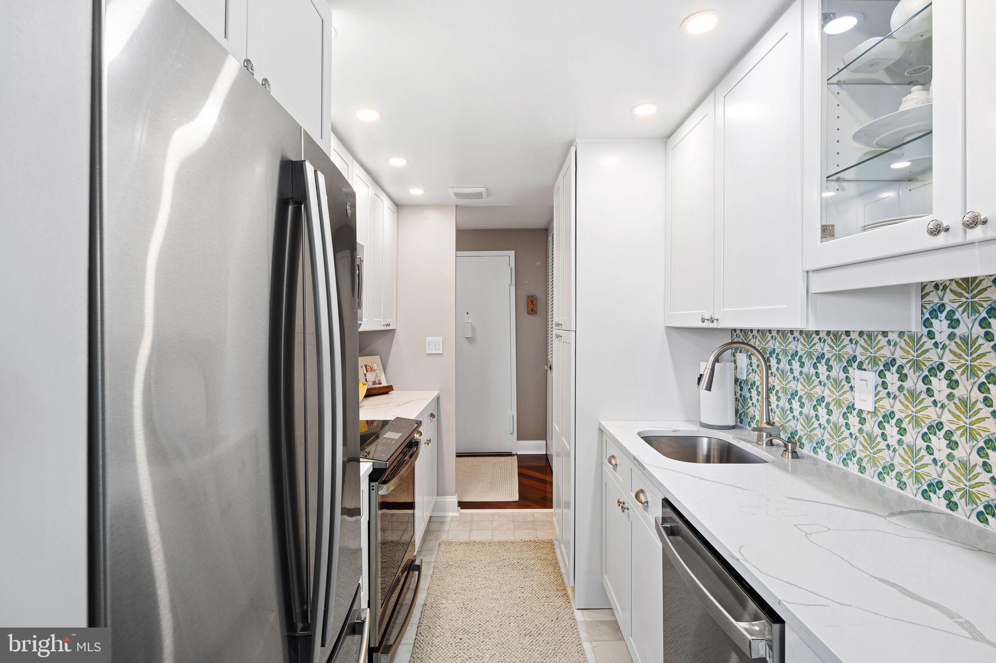 1919 Chestnut Street, Unit 2016 Philadelphia, PA 19103 - Photo 16 of 34 a kitchen with a refrigerator and countertop