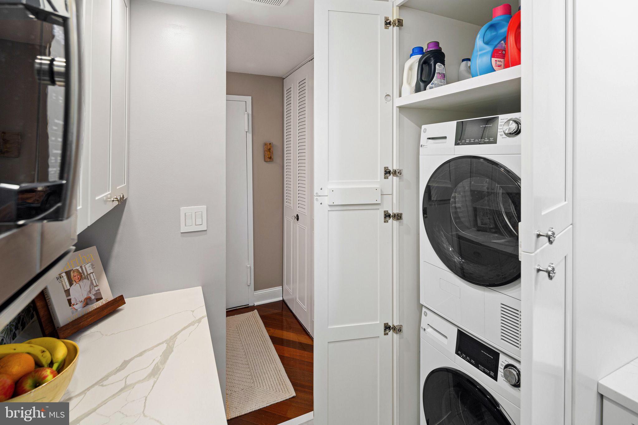 1919 Chestnut Street, Unit 2016 Philadelphia, PA 19103 - Photo 17 of 34 a view of a bedroom with washer and dryer