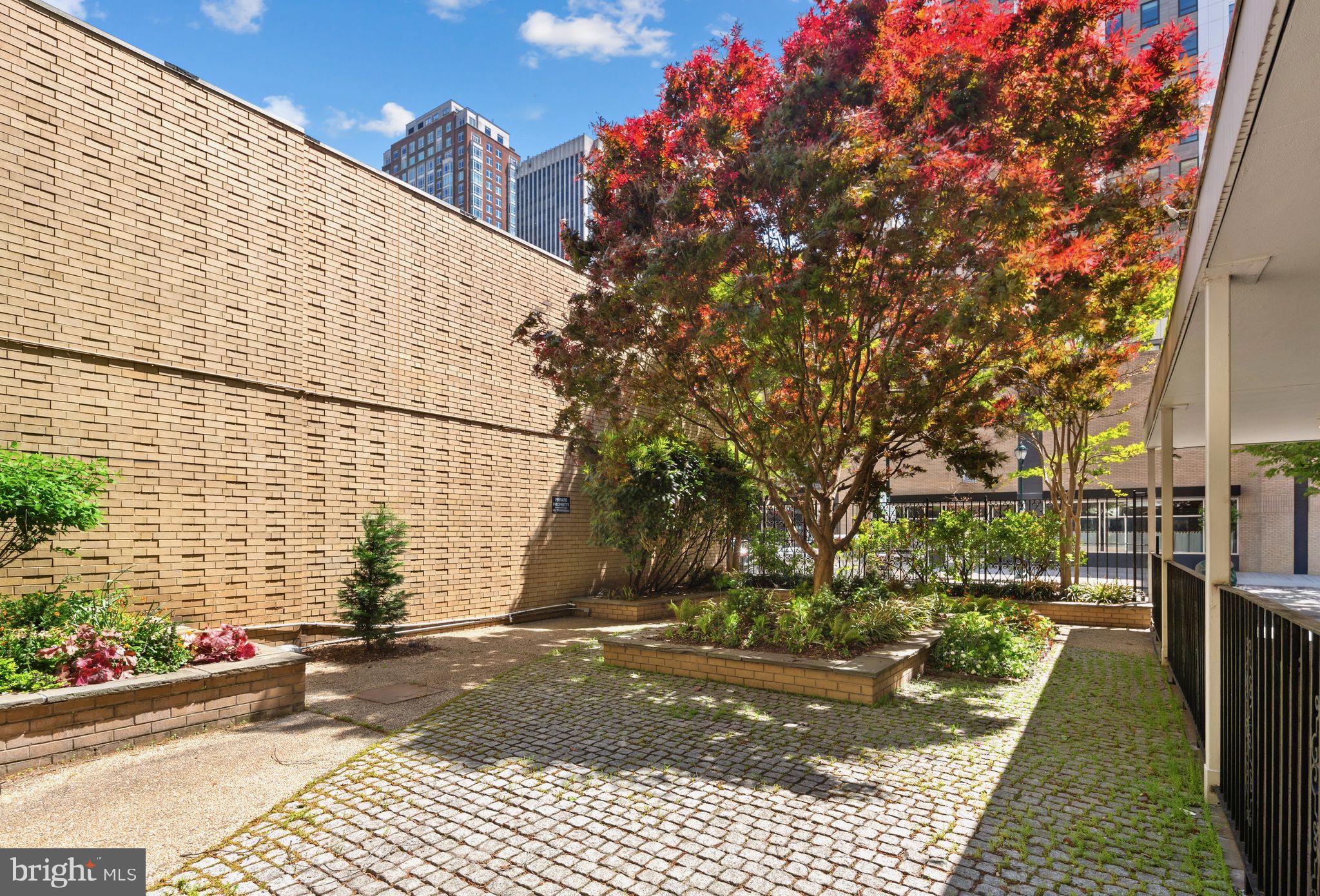 1919 Chestnut Street, Unit 2016 Philadelphia, PA 19103 - Photo 34 of 34 a view of a pathway of a house with a yard
