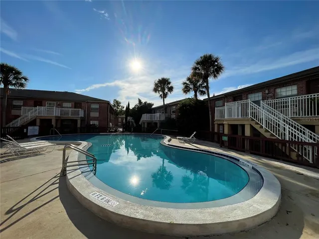 a view of balcony with swimming pool