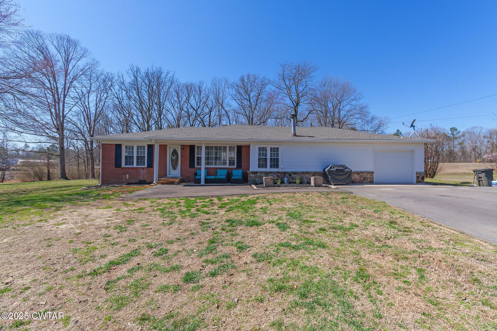 4260 Old Friendship Road Finger, TN 38334 - Photo 1 of 26 front view of a house with a yard
