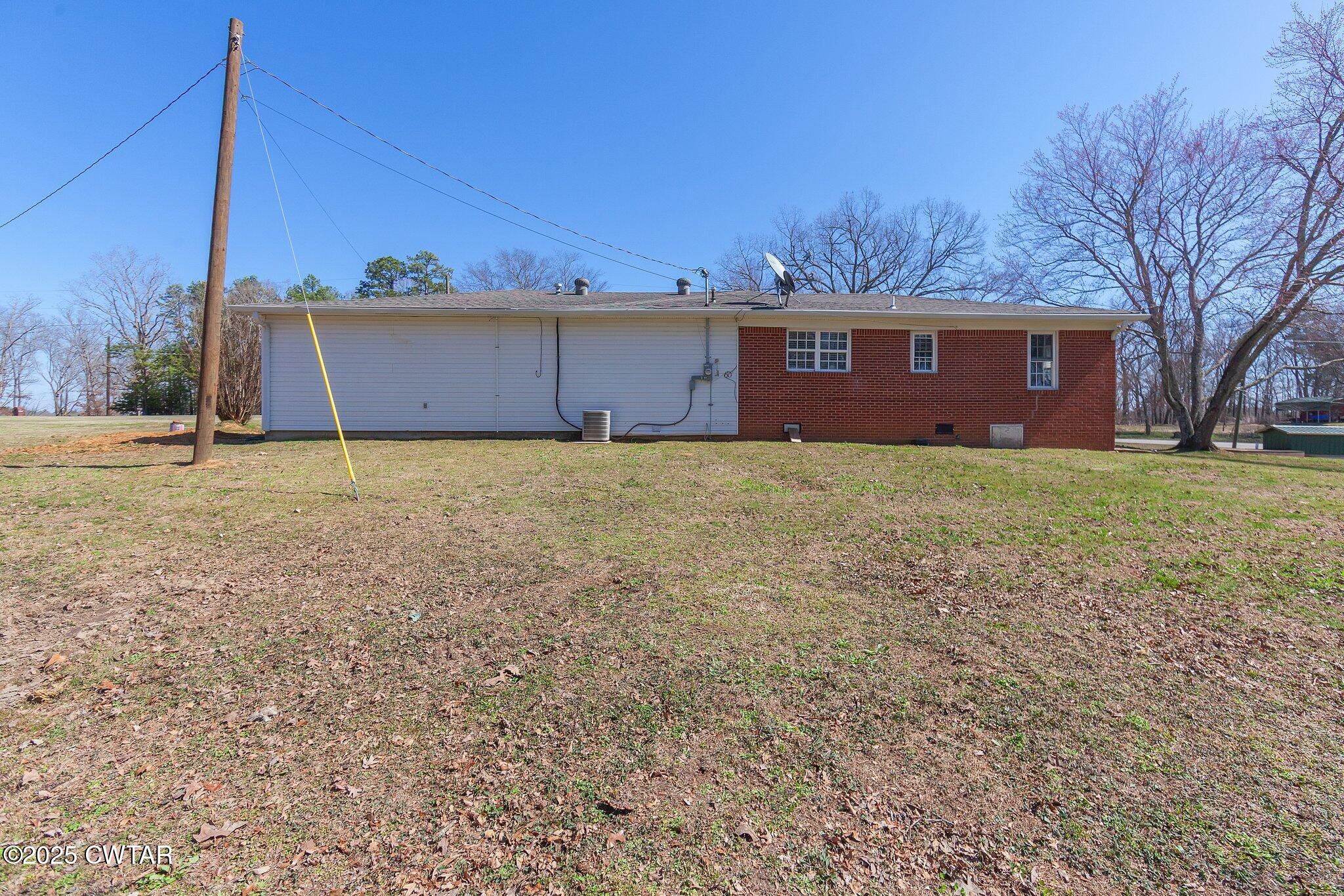 4260 Old Friendship Road Finger, TN 38334 - Photo 22 of 26 a house view with a garden space