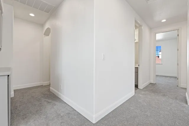 a spacious bathroom with a double vanity sink mirror and double