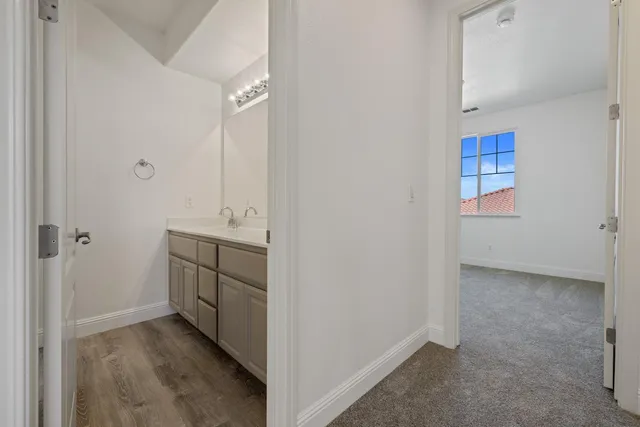 an aerial view of multiple houses with yard