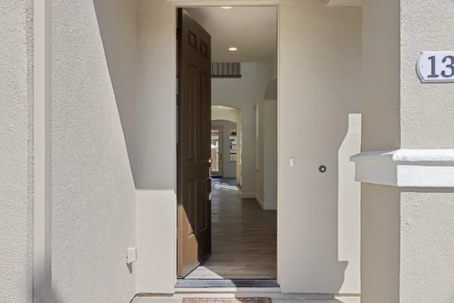 a view of walk in closet with living room