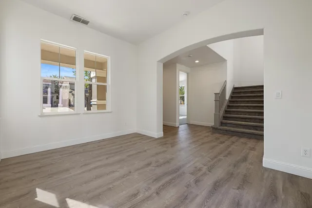 an empty room with windows