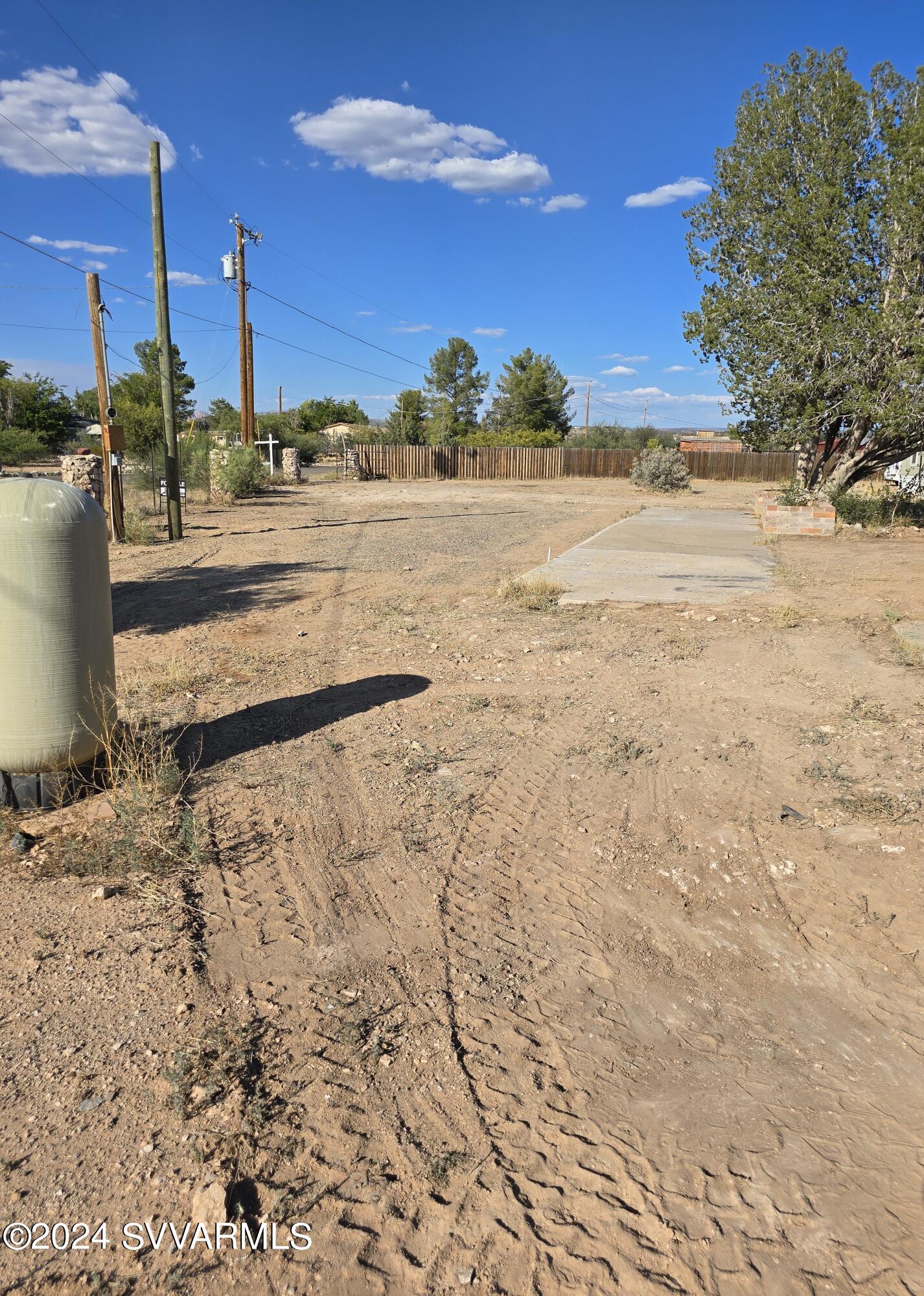 5205 Albatross Road Rimrock, AZ 86335 - Photo 19 of 23 a view of a yard with an trees