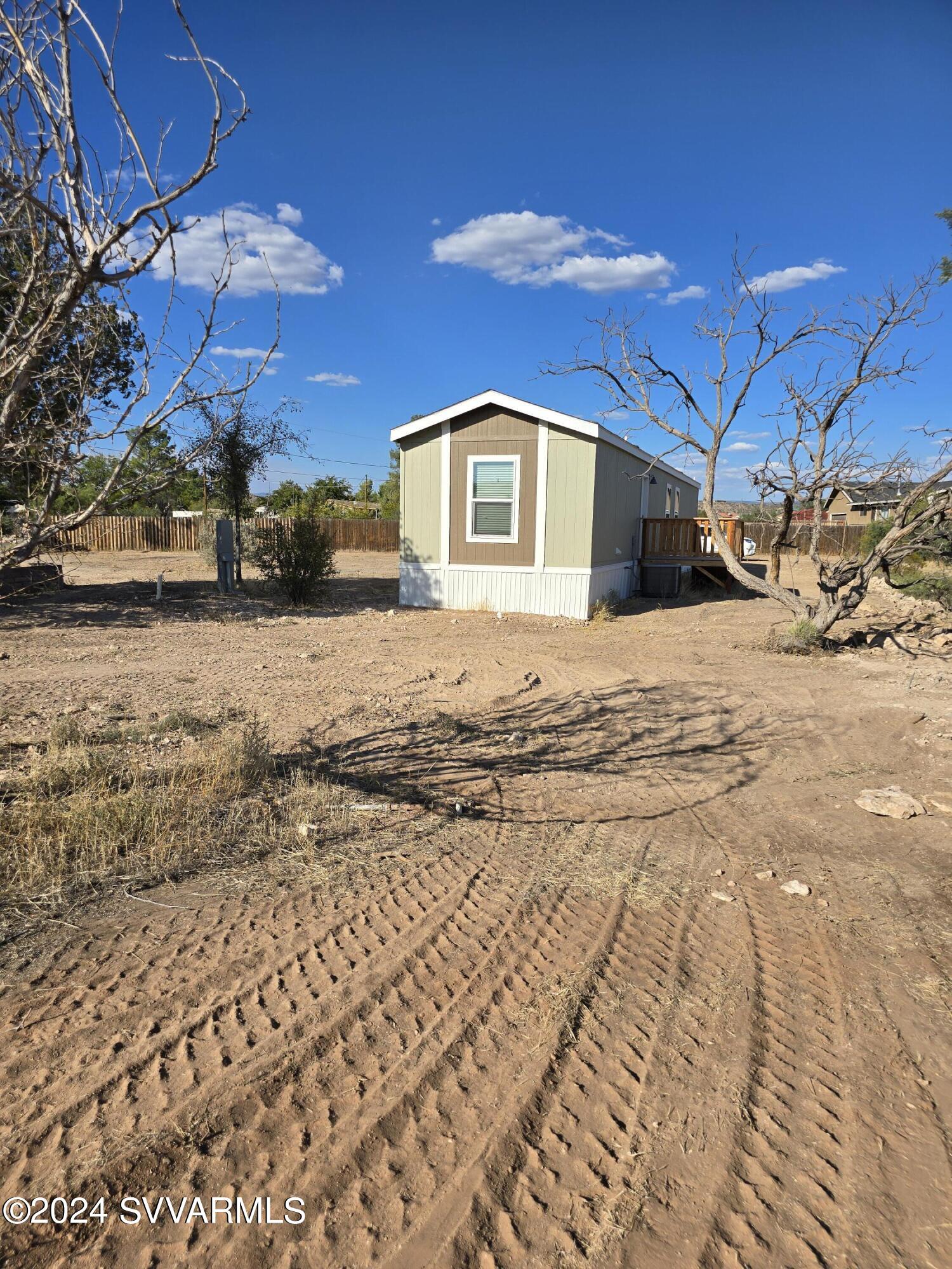 5205 Albatross Road Rimrock, AZ 86335 - Photo 20 of 23 a house with a yard