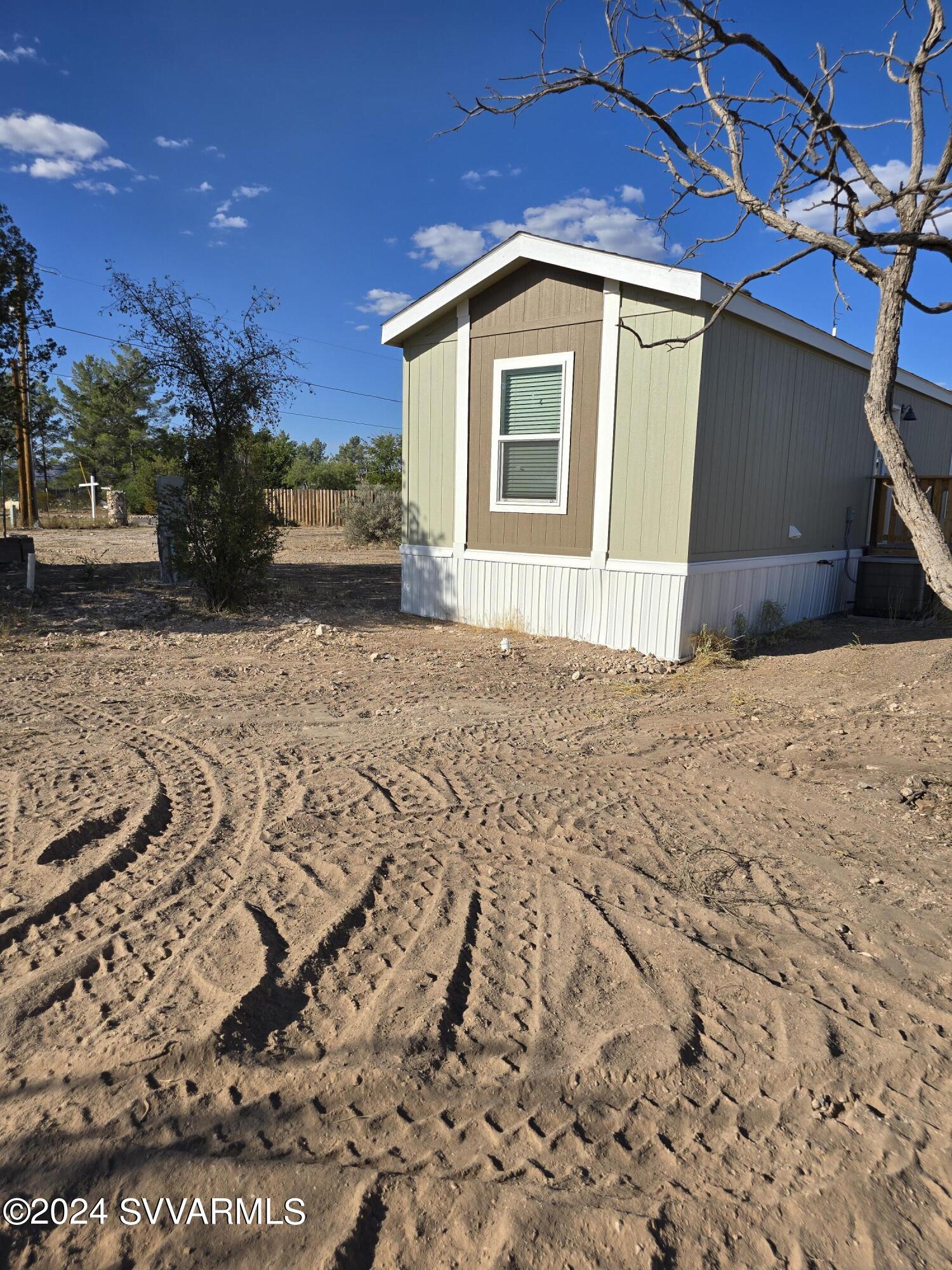 5205 Albatross Road Rimrock, AZ 86335 - Photo 23 of 23 a front view of a house with a yard