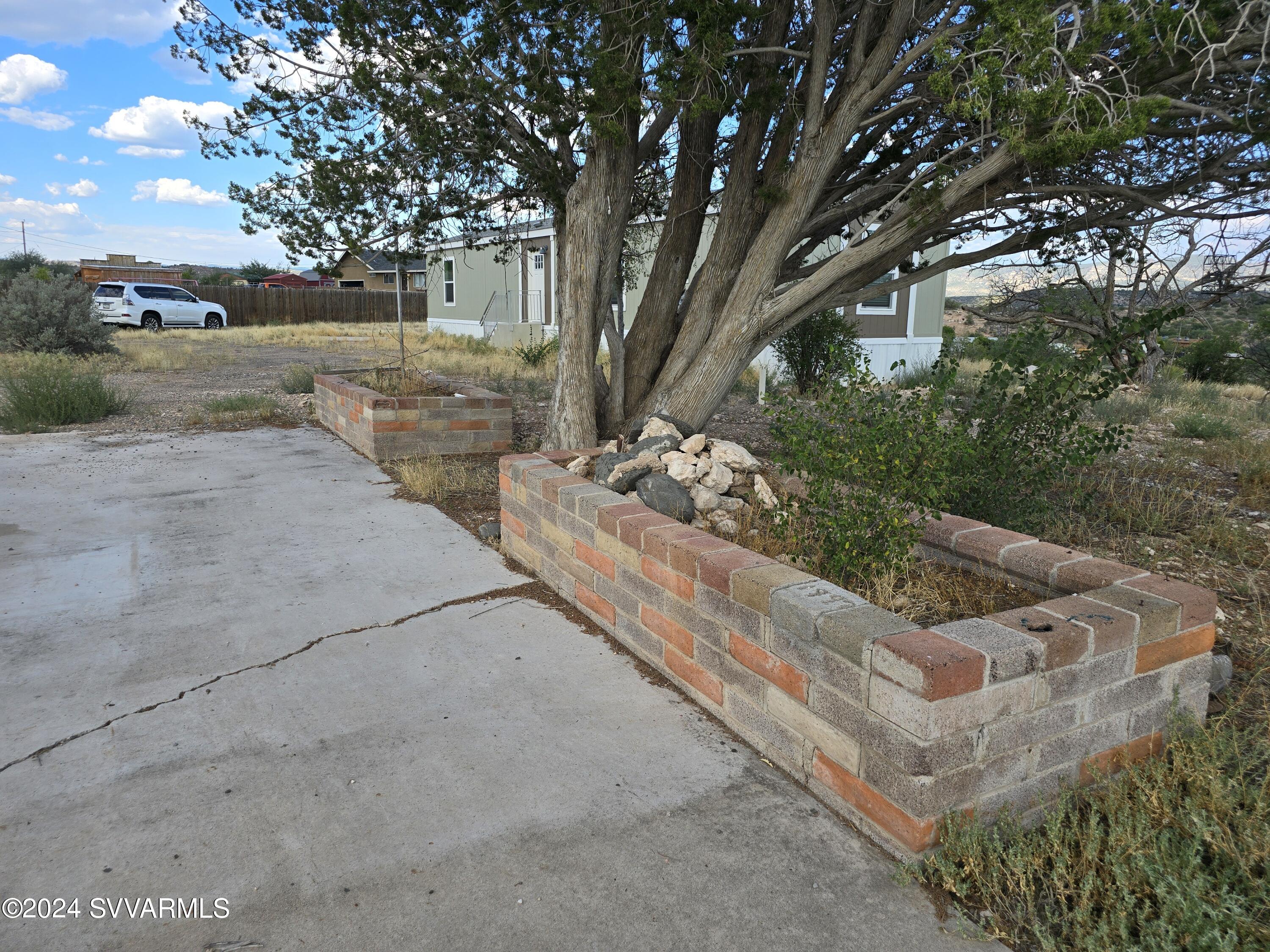 5205 Albatross Road Rimrock, AZ 86335 - Photo 6 of 23 front view of a house with a yard