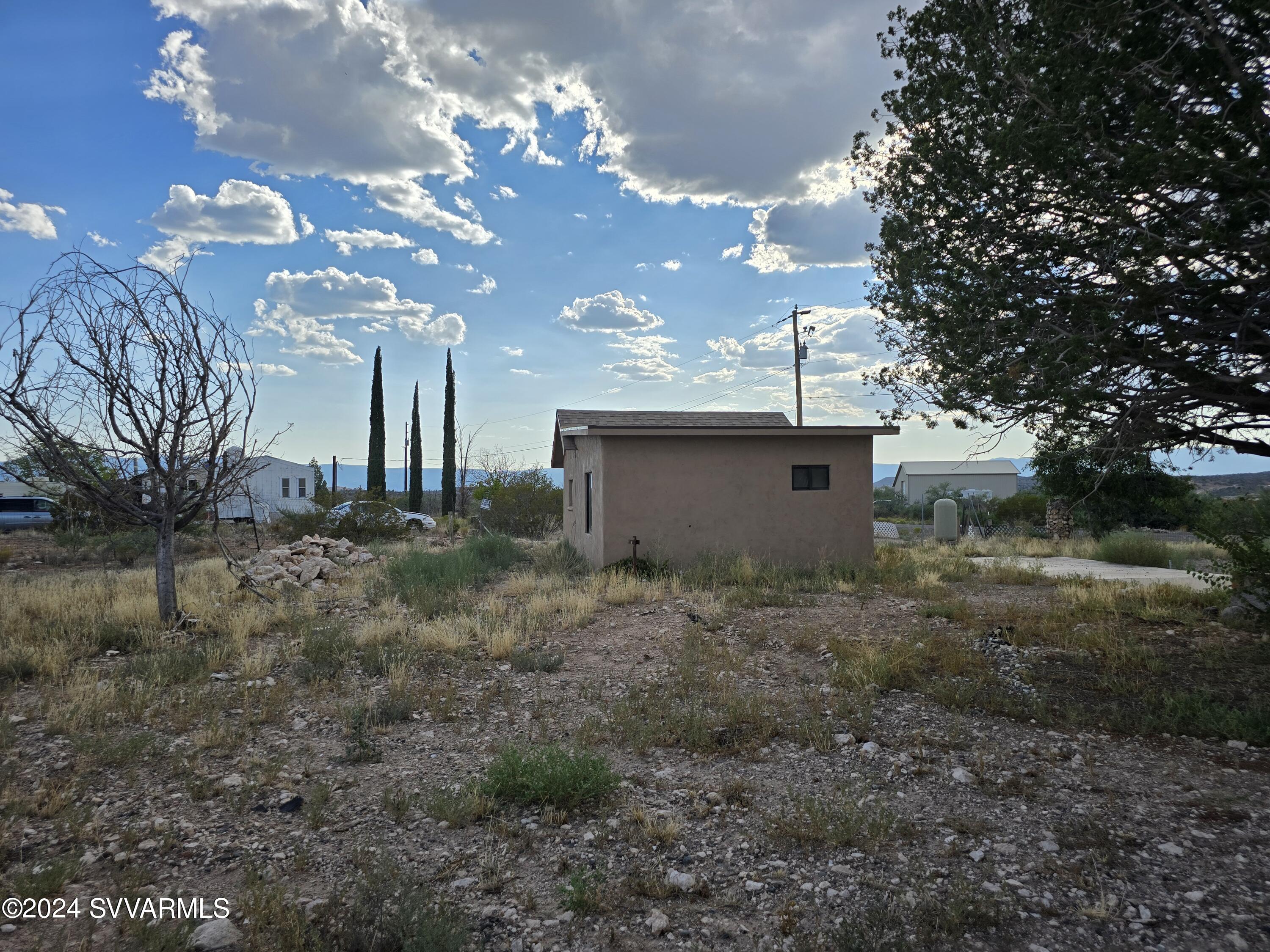 5205 Albatross Road Rimrock, AZ 86335 - Photo 9 of 23 a view of a house with a yard