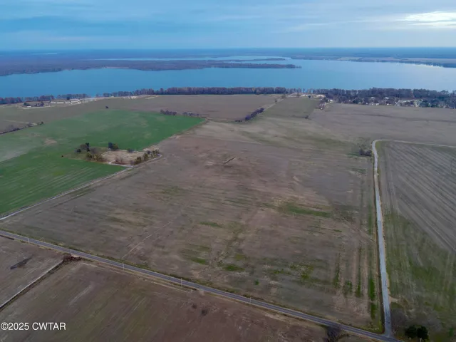 a view of a pathway both side of a lake view
