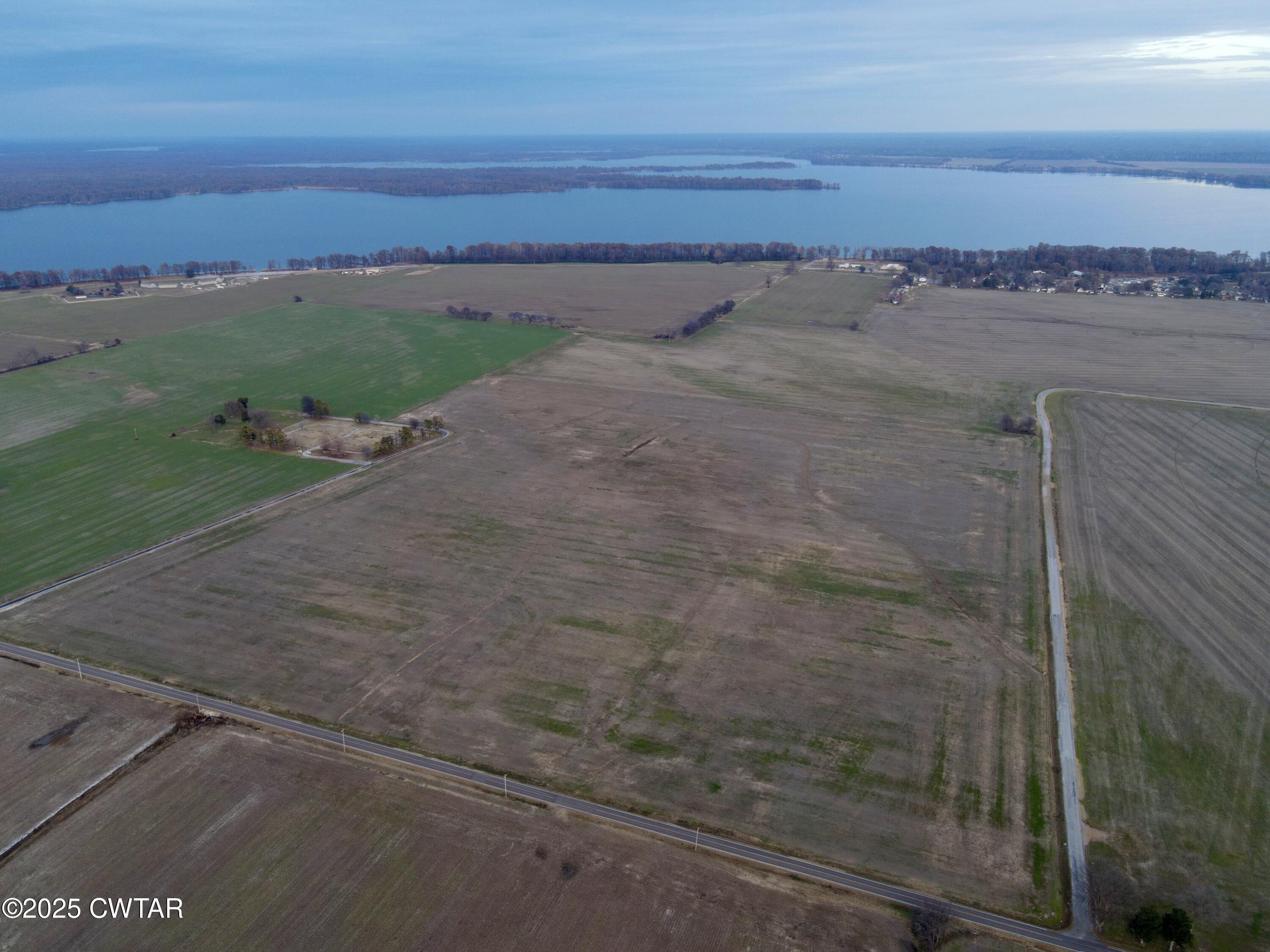 0 Sunkist Beach Road Tiptonville, TN 38079 - Photo 2 of 24 a view of a pathway both side of a lake view