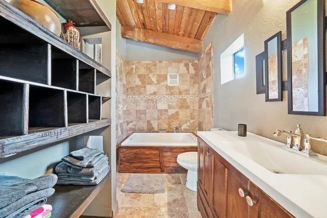 a bathroom with a sink and a bathtub