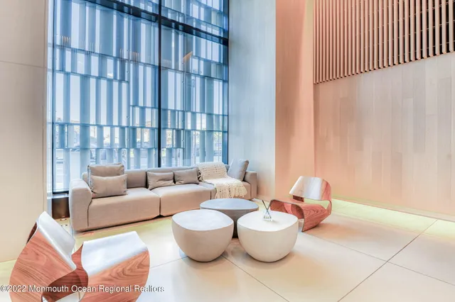 a view of a kitchen with a sink and cabinets