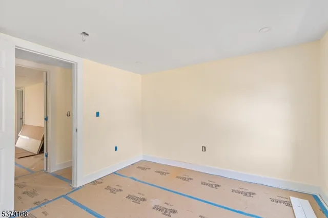 a bathroom with a sink and a window