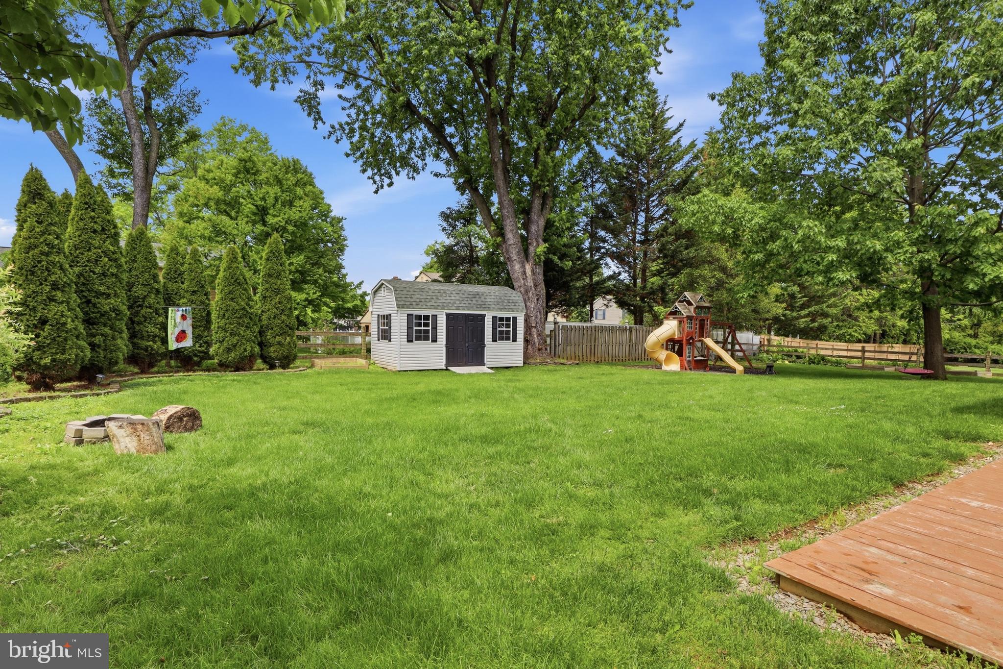 1072 Lambley Road Landisville, PA 17538 - Photo 14 of 46 a view of a house with backyard and a tree