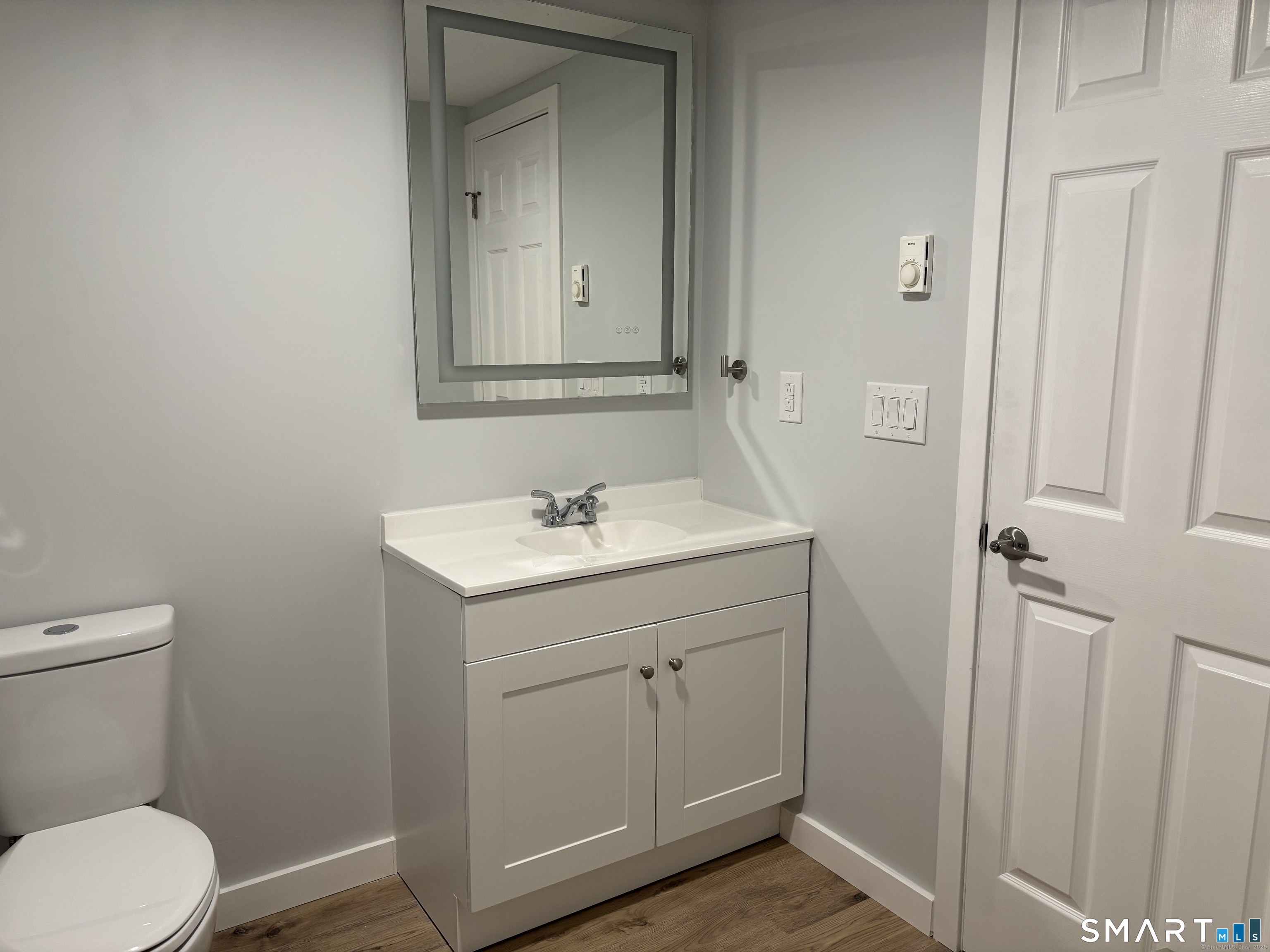 82 Longview Street, Unit 36 Waterford, CT 06385 - Photo 11 of 14 a bathroom with a sink toilet and vanity
