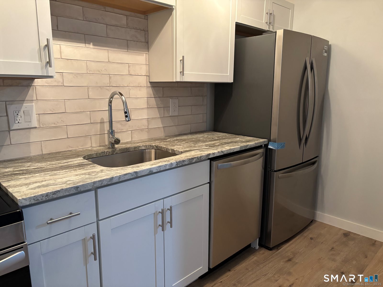 82 Longview Street, Unit 36 Waterford, CT 06385 - Photo 4 of 14 a kitchen with appliances and cabinets