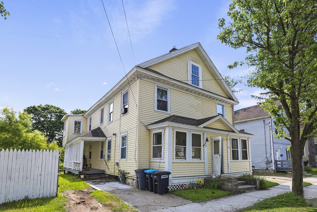 50-52 John Street Pittsfield, MA 01201 - Photo 2 of 24 a front view of a house with garden
