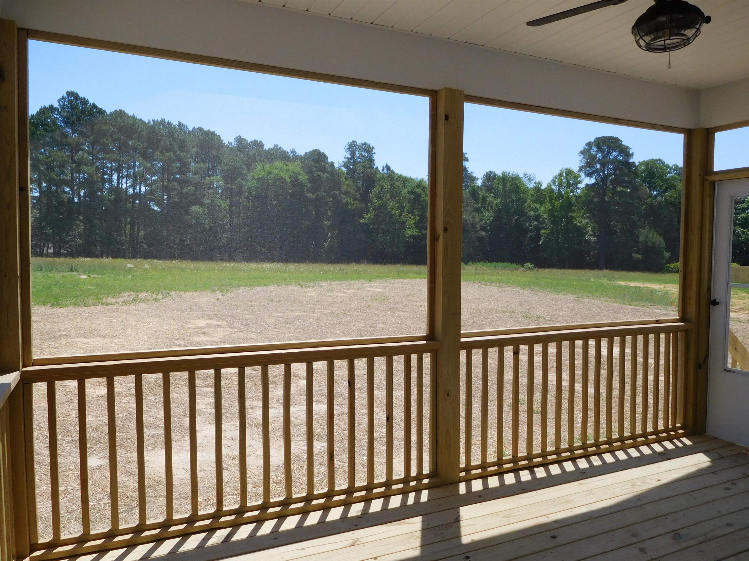 77 Old Whitley Road Wendell, NC 27591 - Photo 9 of 26 View from Screened Porch