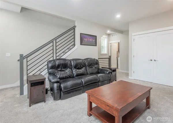 a living room with furniture and a couch