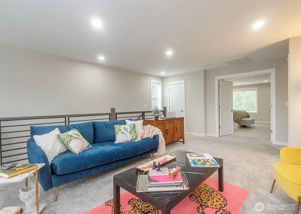 a living room with furniture and a table