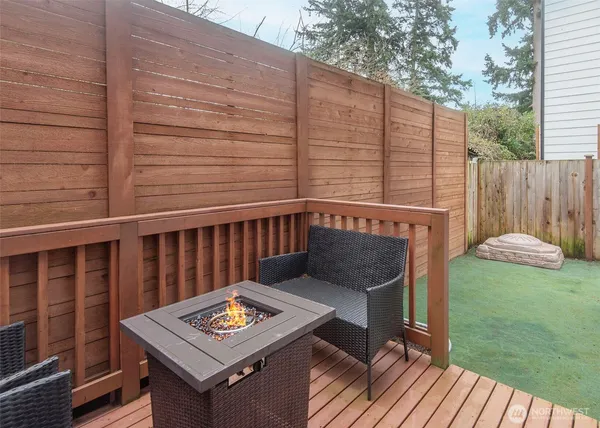 a view of a balcony with furniture