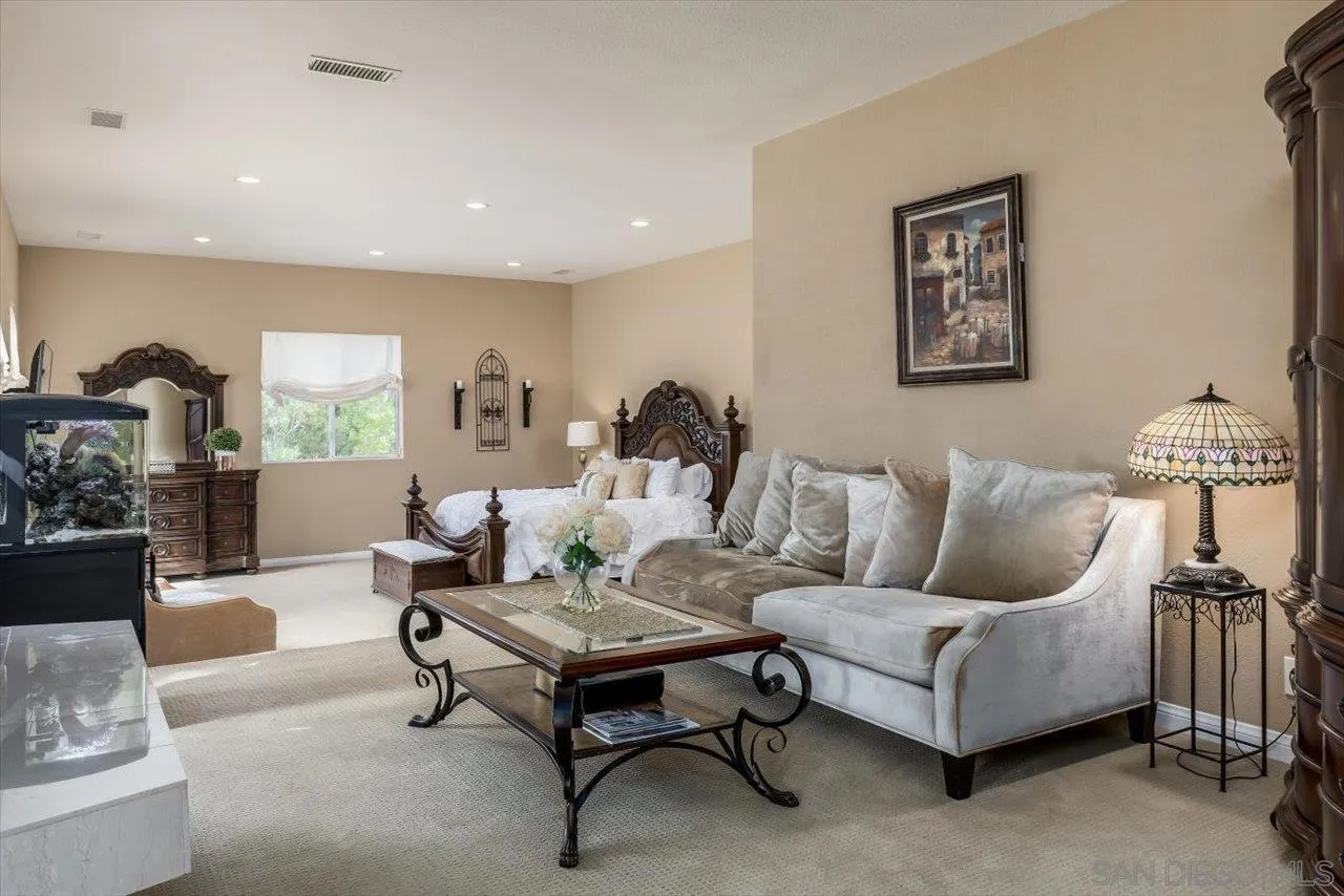 16348 Country Day Road Poway, CA 92064 - Photo 15 of 38 a living room with furniture and a table