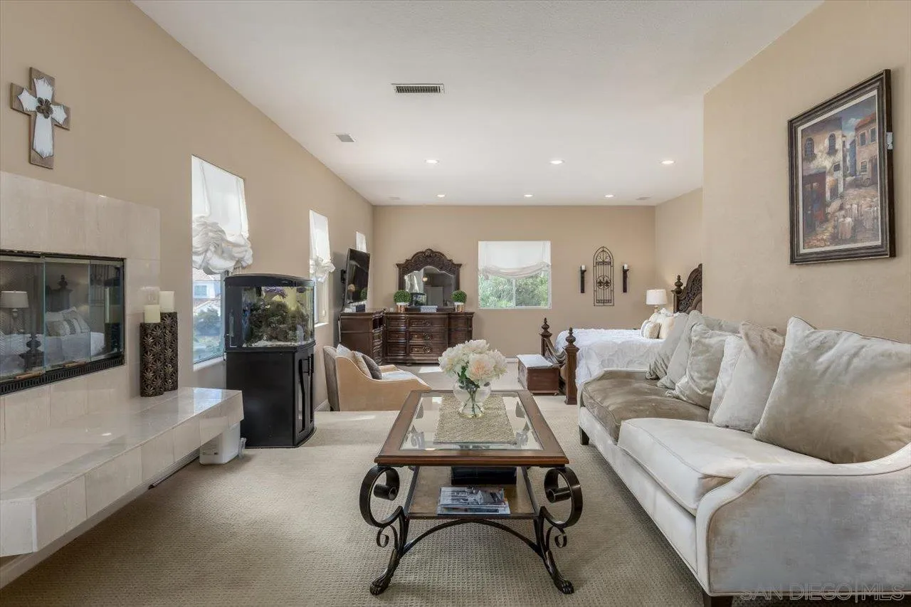16348 Country Day Road Poway, CA 92064 - Photo 16 of 38 a living room with furniture and a flat screen tv