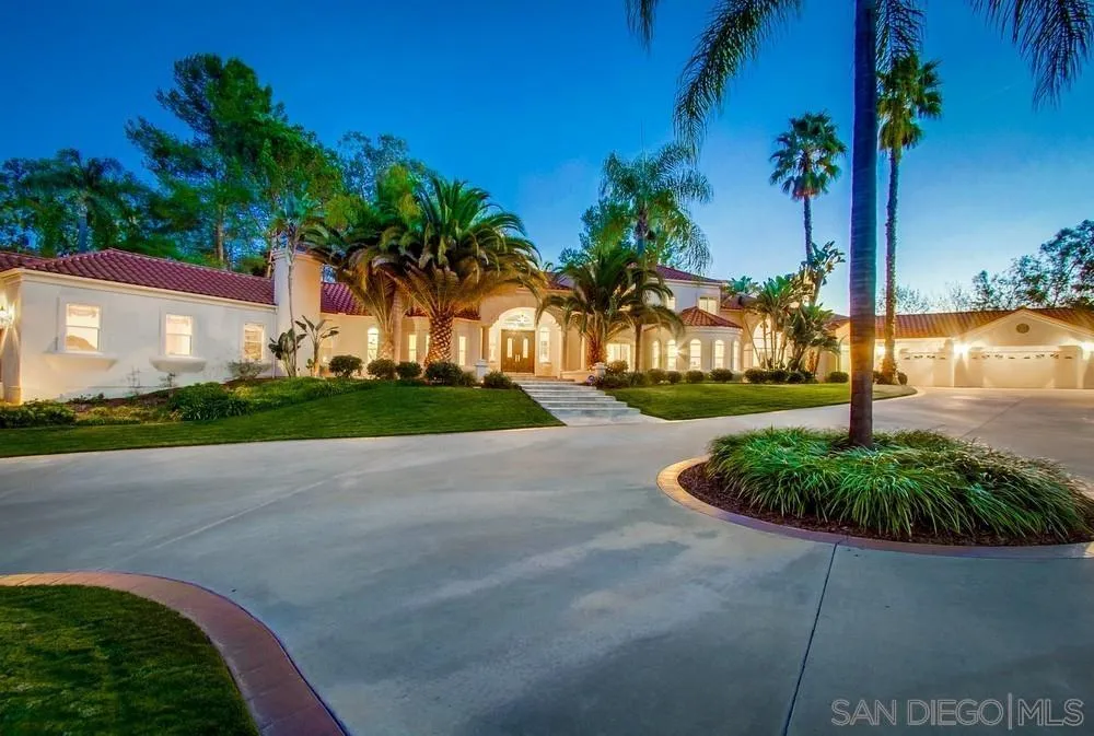 16348 Country Day Road Poway, CA 92064 - Photo 2 of 38 a front view of a house with garden and trees