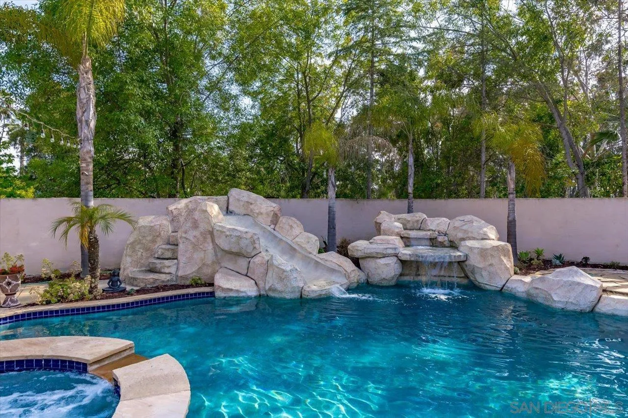 16348 Country Day Road Poway, CA 92064 - Photo 4 of 38 a backyard of a house with table and chairs