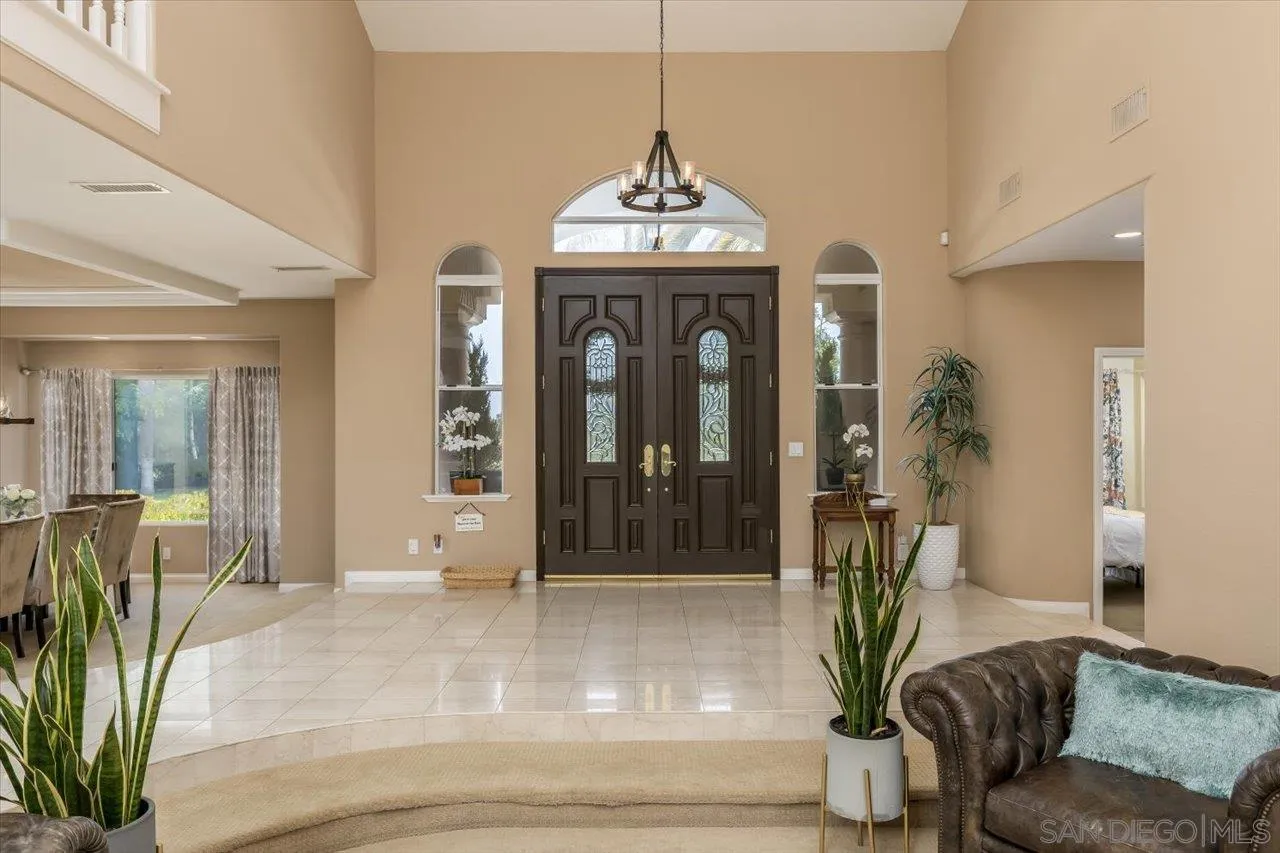 16348 Country Day Road Poway, CA 92064 - Photo 5 of 38 a living room with furniture and a potted plant