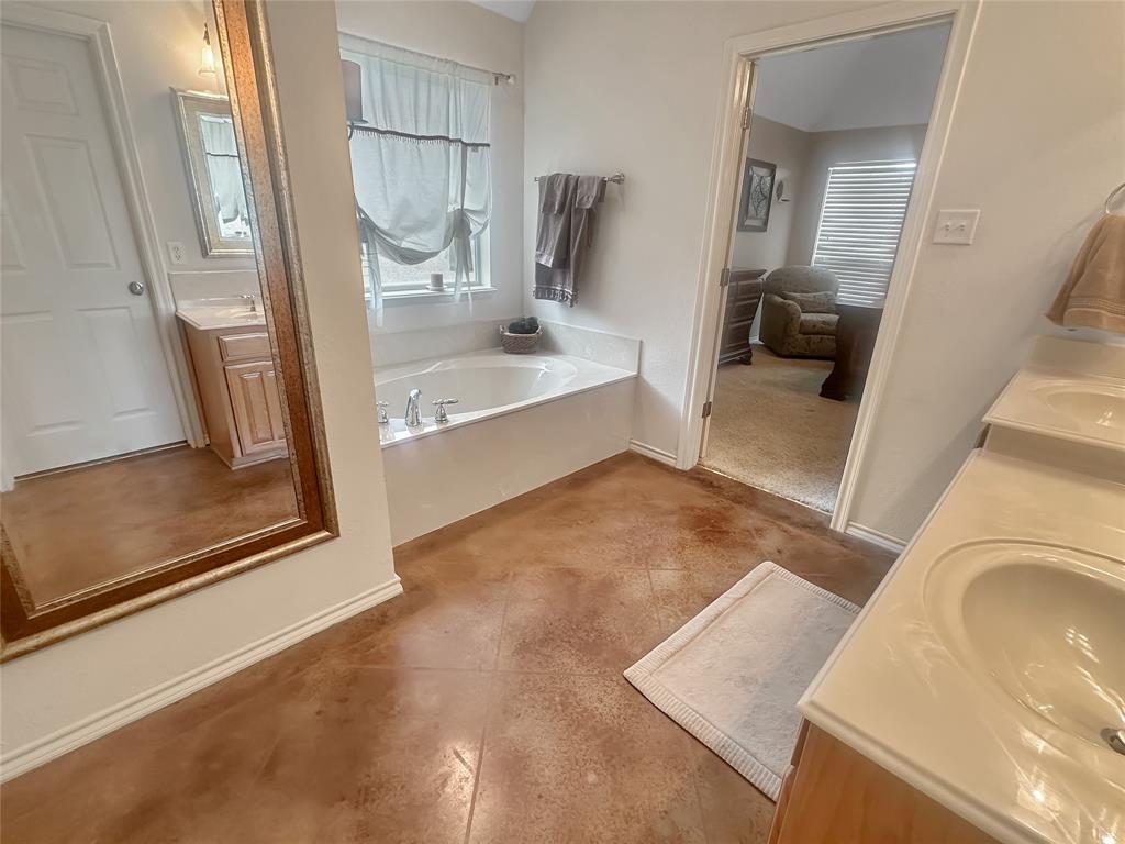 10717 Greenview Court Benbrook, TX 76126 - Photo 11 of 36 view of living room with furniture and a fireplace