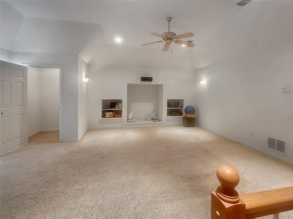 10717 Greenview Court Benbrook, TX 76126 - Photo 20 of 36 a view of a livingroom with a fireplace